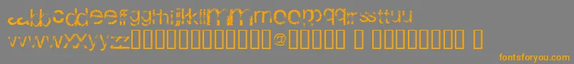 WackyArial-Schriftart – Orangefarbene Schriften auf grauem Hintergrund