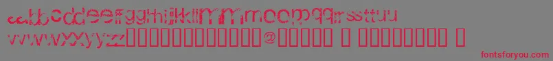 WackyArial-Schriftart – Rote Schriften auf grauem Hintergrund