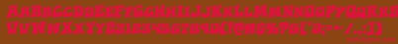 フォントHippocketrotal – 赤い文字が茶色の背景にあります。