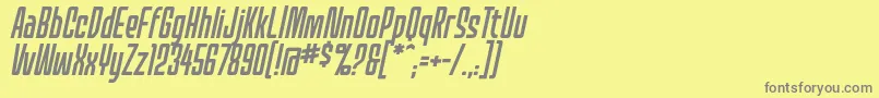 MecheffectsonelcbbItal-fontti – harmaat kirjasimet keltaisella taustalla