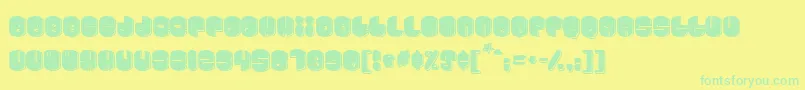 Cosmojunk Font – Green Fonts on Yellow Background