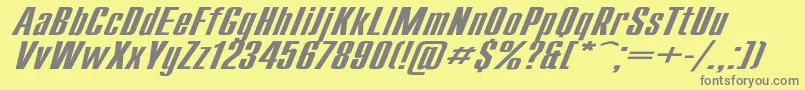 CompactExItalic-fontti – harmaat kirjasimet keltaisella taustalla
