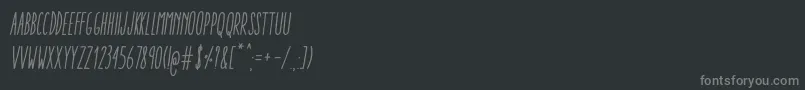 AracneUltraCondensedRegularItalic Font – Gray Fonts on Black Background