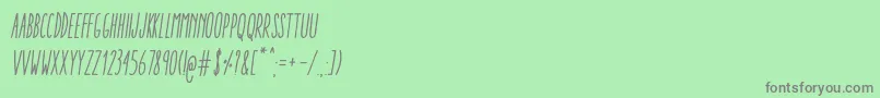 AracneUltraCondensedRegularItalic Font – Gray Fonts on Green Background
