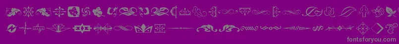 Weitere Informationen zur Typeembellishmentstwo-Schriftart Typeembellishmentstwo-Schriftart – Graue Schriften auf violettem Hintergrund