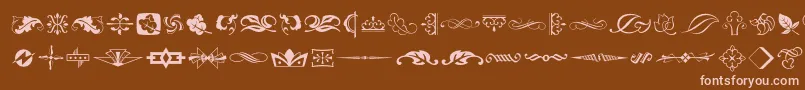 Czcionka Typeembellishmentstwo – różowe czcionki na brązowym tle