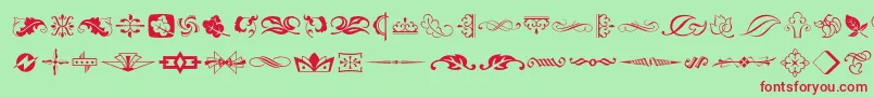 Typeembellishmentstwo Font – Red Fonts on Green Background
