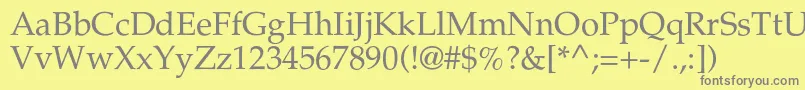 フォントAgpalatialc – 黄色の背景に灰色の文字