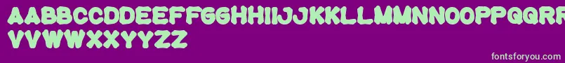 Tortoise Font – Green Fonts on Purple Background