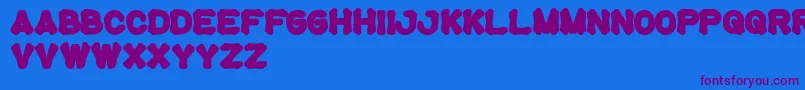 Tortoise Font – Purple Fonts on Blue Background