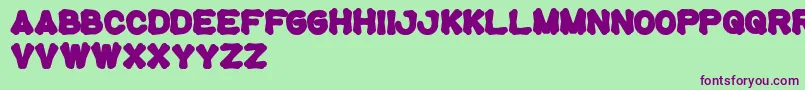 Tortoise Font – Purple Fonts on Green Background