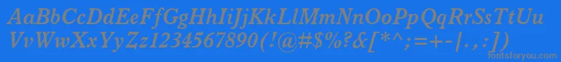 Fonte ItalianOldStyleMtBoldItalic – fontes cinzas em um fundo azul
