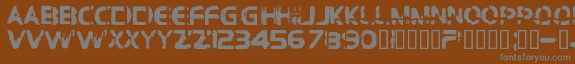 Bdbrocke-Schriftart – Graue Schriften auf braunem Hintergrund