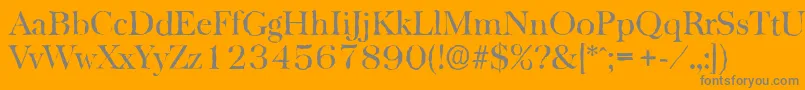 BaskervilleantiqueRegular-fontti – harmaat kirjasimet oranssilla taustalla