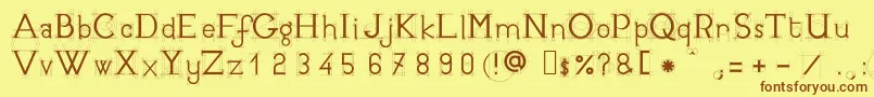 フォントJbetudeRegular – 茶色の文字が黄色の背景にあります。