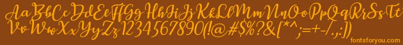 BreettyItalic Font – Orange Fonts on Brown Background