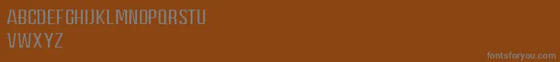 Czcionka CarpeDiemMiddle – szare czcionki na brązowym tle