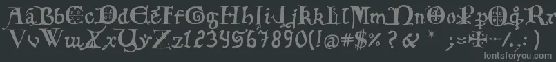 12thCfancyCaps-Schriftart – Graue Schriften auf schwarzem Hintergrund
