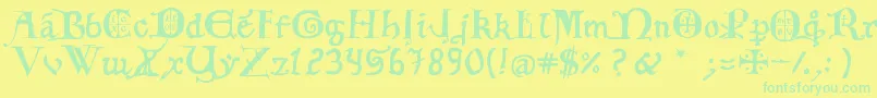 12thCfancyCaps Font – Green Fonts on Yellow Background