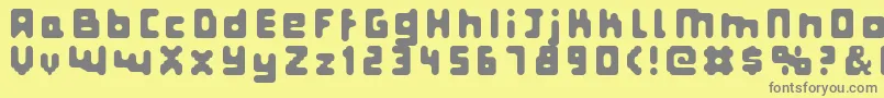 フォントFatPixels – 黄色の背景に灰色の文字