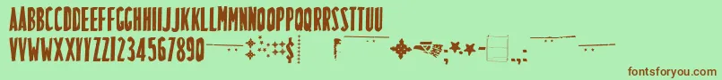 フォントLuchitapayolTecnica – 緑の背景に茶色のフォント