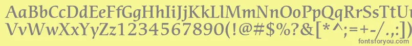 フォントCerigostdMedium – 黄色の背景に灰色の文字