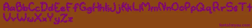 Watertoy Font – Purple Fonts on Brown Background