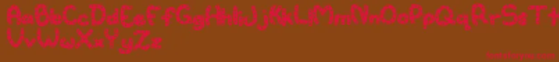 Watertoy Font – Red Fonts on Brown Background