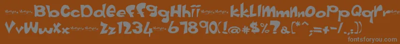 Vertigirl-Schriftart – Graue Schriften auf braunem Hintergrund