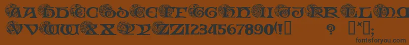 フォントSpiralInitials – 黒い文字が茶色の背景にあります