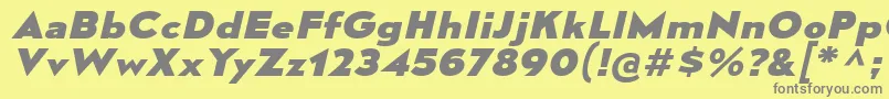 MesmerizeExEbIt-fontti – harmaat kirjasimet keltaisella taustalla