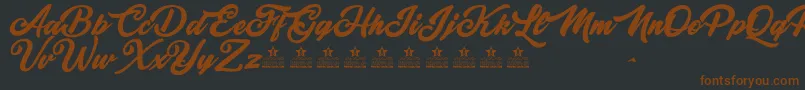 MajesticPersonalUse Font – Brown Fonts on Black Background