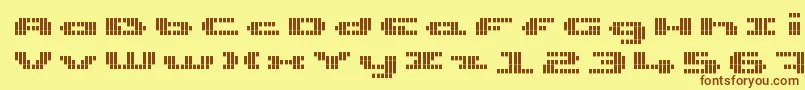 UpTinyLcdFourDecov Font – Brown Fonts on Yellow Background