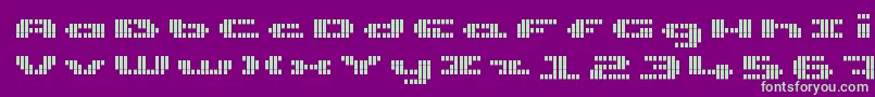 UpTinyLcdFourDecov Font – Green Fonts on Purple Background