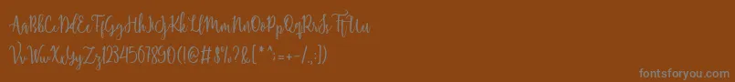 Shellaherascriptdemo Font – Gray Fonts on Brown Background