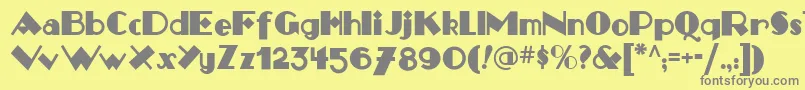 フォントMonkey Fingers Nf – 黄色の背景に灰色の文字