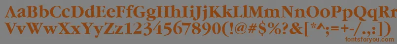 フォントGourmandBold – 茶色の文字が灰色の背景にあります。