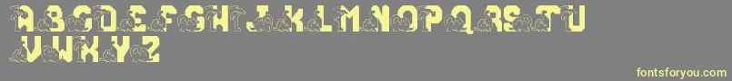 LmsConradasaur Font – Yellow Fonts on Gray Background