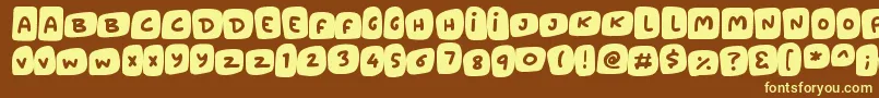 Marshmallows-fontti – keltaiset fontit ruskealla taustalla
