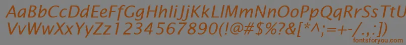 フォントLucidaSansItalic – 茶色の文字が灰色の背景にあります。