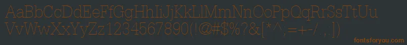 フォントInstallationLightSsiThin – 黒い背景に茶色のフォント