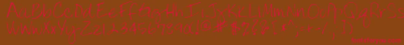 LindyRegular Font – Red Fonts on Brown Background