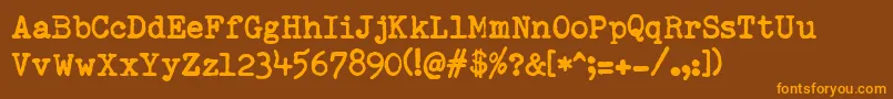RemingtonedType Font – Orange Fonts on Brown Background