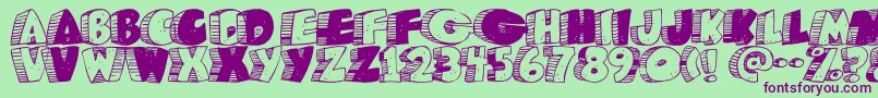 Caveman ffy Font – Purple Fonts on Green Background