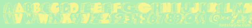 Czcionka Caveman ffy – żółte czcionki na zielonym tle