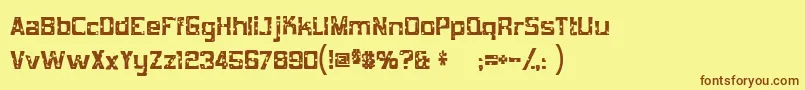 フォントMobconcr – 茶色の文字が黄色の背景にあります。