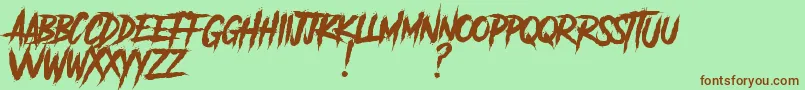 Fonte AnotherDangerDemo – fontes marrons em um fundo verde