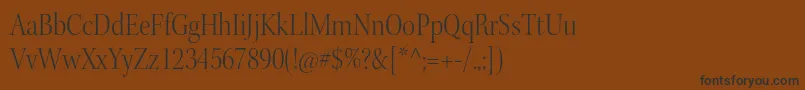 フォントKeplerstdLightscndisp – 黒い文字が茶色の背景にあります