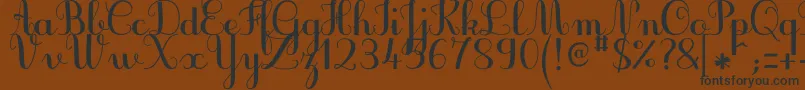 JbcursiveV3Bold Font – Black Fonts on Brown Background