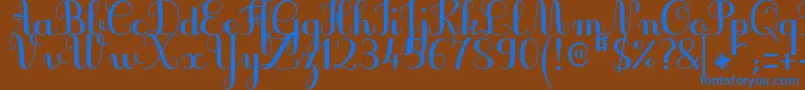 JbcursiveV3Bold Font – Blue Fonts on Brown Background
